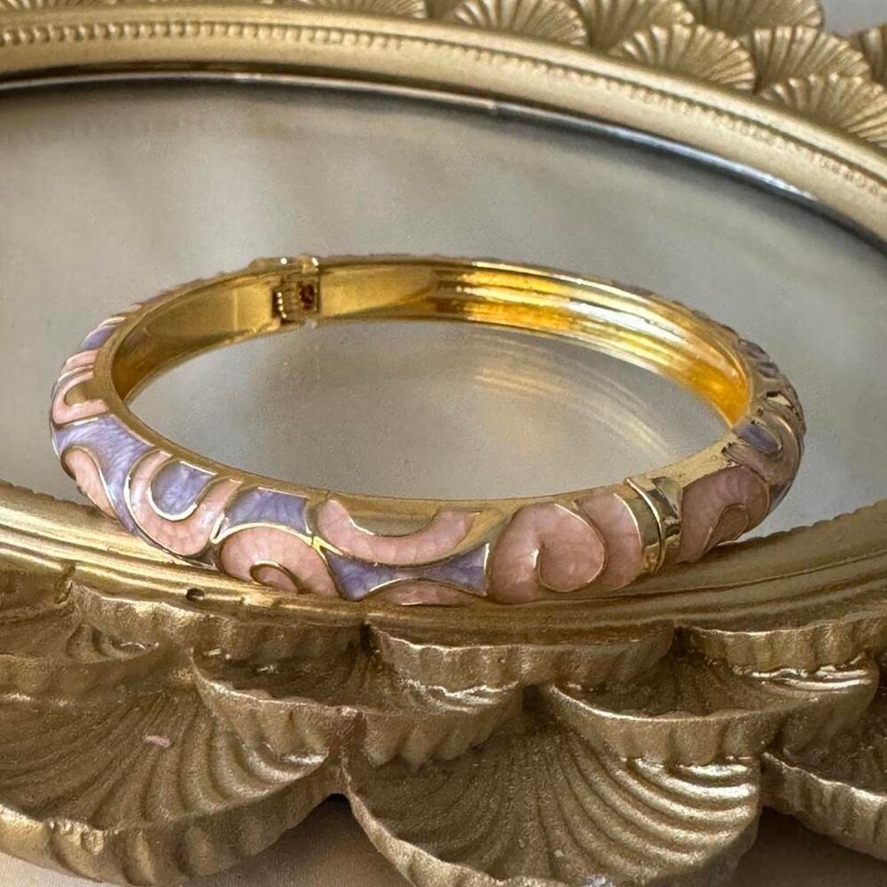 Gold tone bangle with pink
